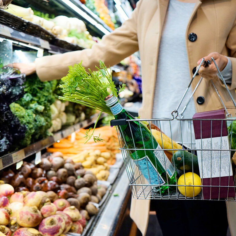 Woman food shopping making healthy selections