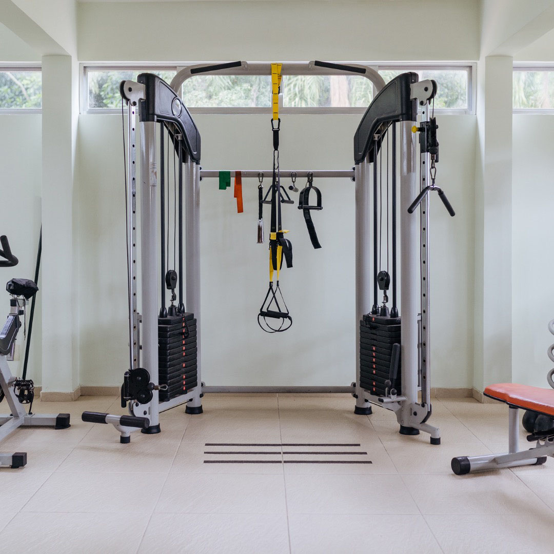 Functional trainer weight equipment in a home gym