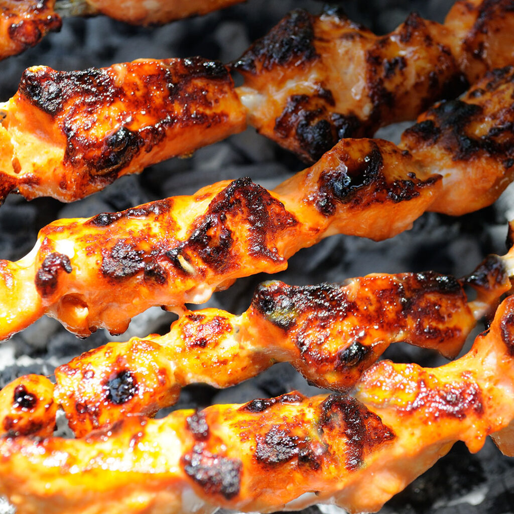 Chicken Kebabs cooking on the grill